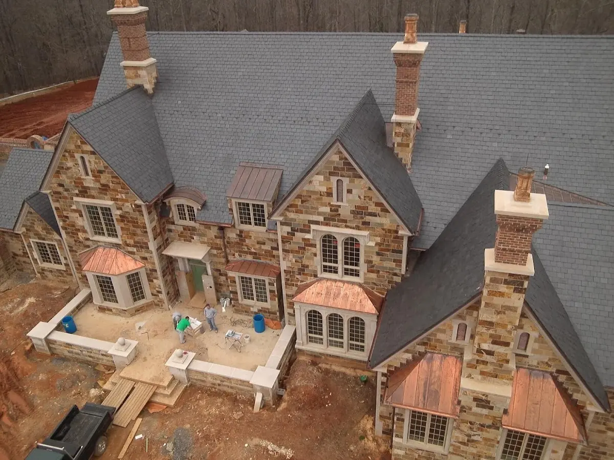 Craftsman Roofing Slate Roof Repair project in Houston